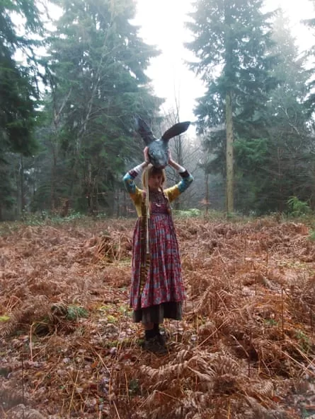 Josephine Illingworth standing in a woodland clearing