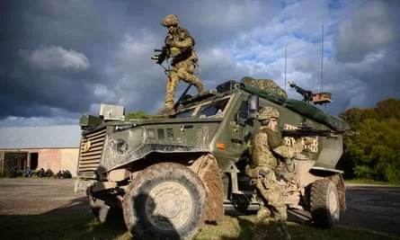 Soldiers from the Royal Anglian Regiment on training; the defence budget is to rise to 2.5% of GDP by 2027.