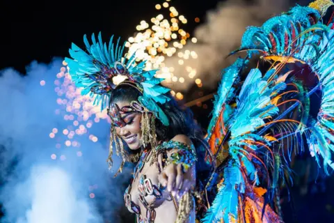 Courtesy of LizBliz Entertainment A woman wearing a elaborate costume at Trinidad's carnival