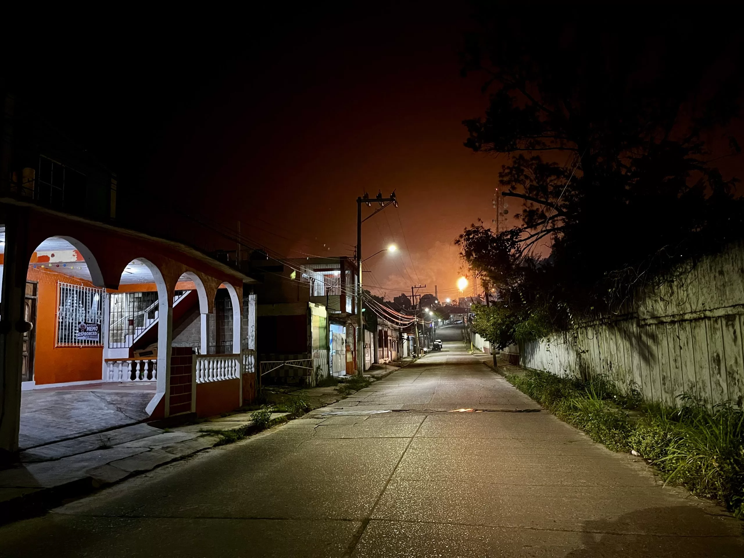 Gas flare in Mexico observed from the streets of Minatitlan. Oil giant Pemex emissions threaten Mexico's net zero goal